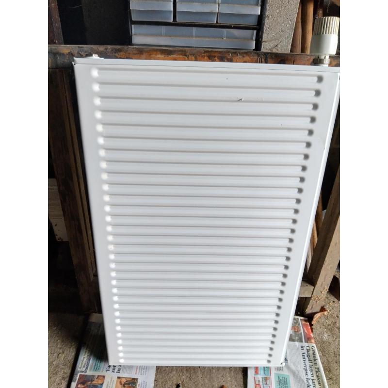 Radiator met thermostatische kraan