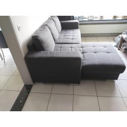 Donkergrijze stoffen hoeksalon met longchair