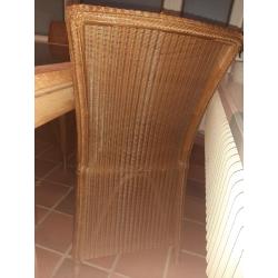 Mooie tafelset van Vincent Sheppard met massief granieten blad en 4 rotanstoelen