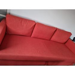 Orange sofa bed