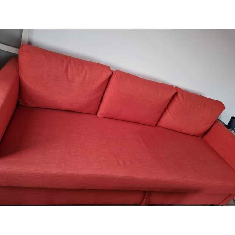 Orange sofa bed
