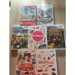 Wii console plus wii fit , wii zumba , wii your shape