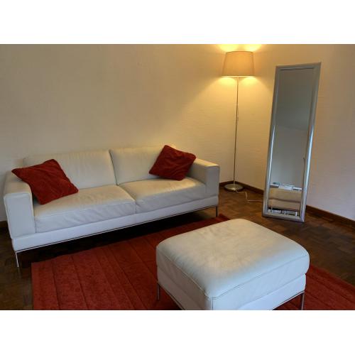Wit lederen bank 4 personen