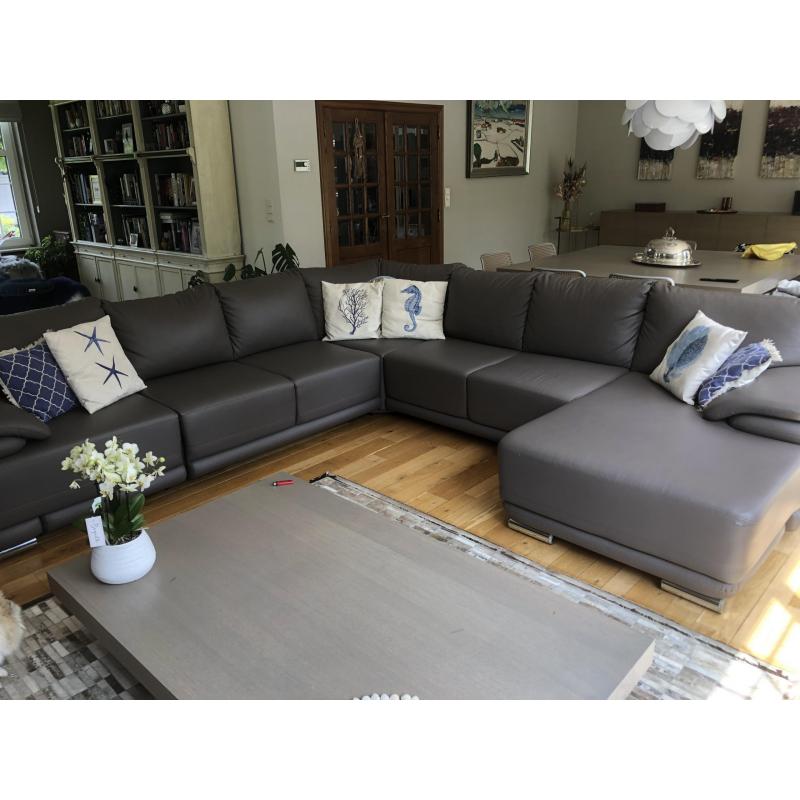 Hoeksalon grijs met bed en opbergfunctie