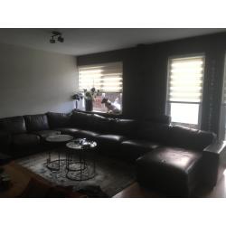 Grote hoeksalon hoekbank bruin leer