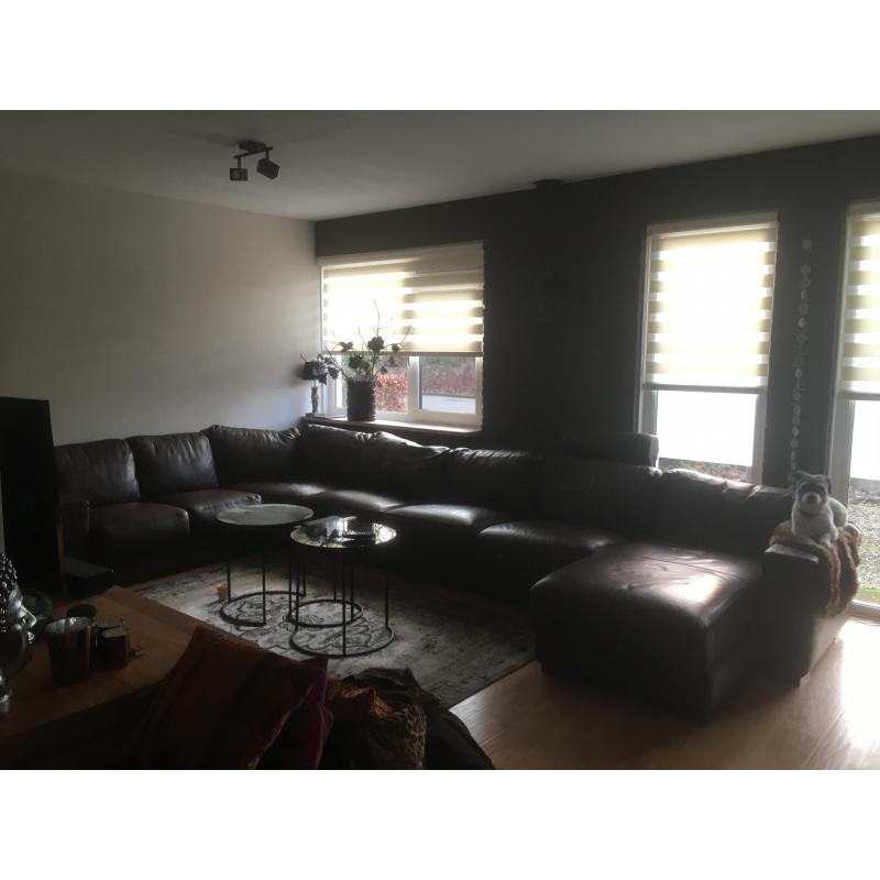 Grote hoeksalon hoekbank bruin leer
