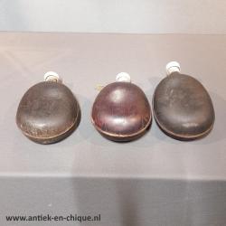 Antieke houten veldflessen