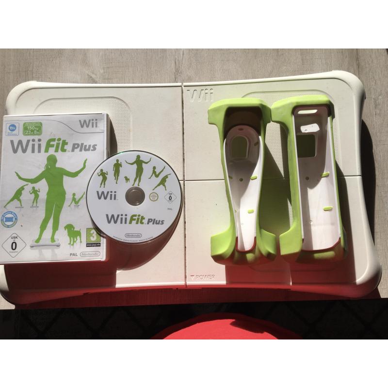 Wii console plus wii fit , wii zumba , wii your shape