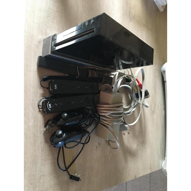 Wii console plus wii fit , wii zumba , wii your shape