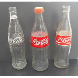 25 Coca-Cola flessen kroonkurk relief contourfles - PARTIJ