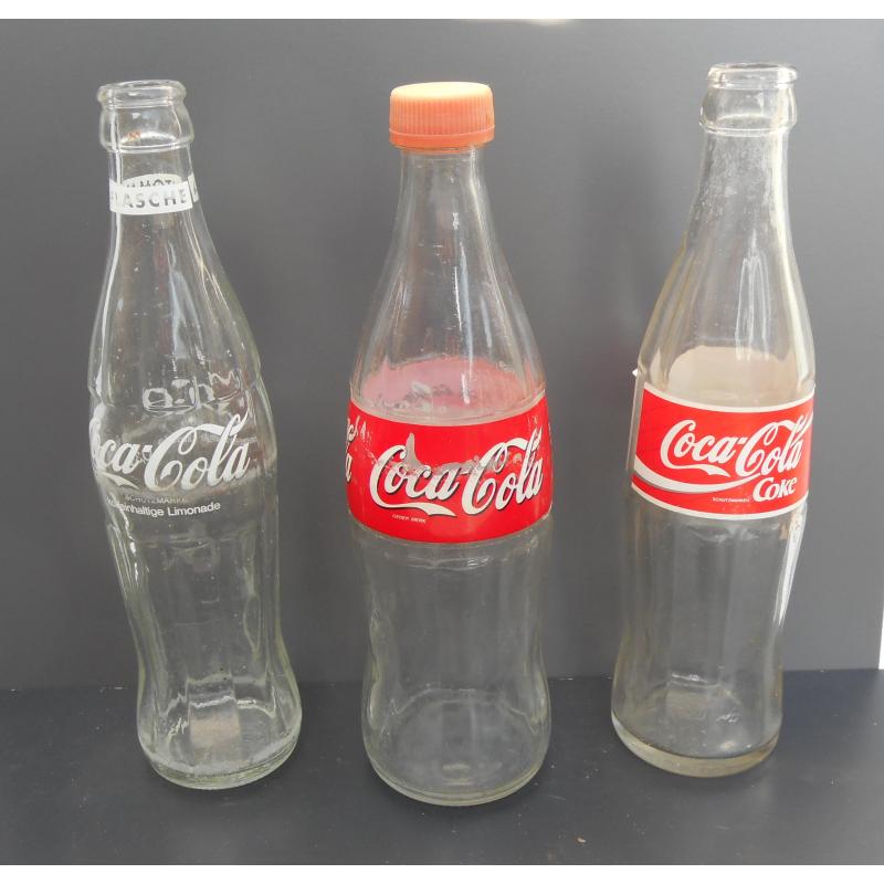 25 Coca-Cola flessen kroonkurk relief contourfles - PARTIJ