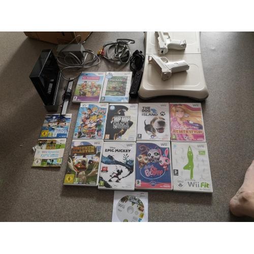 Wii console met 14 games enz