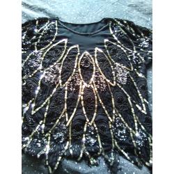 Zeer mooie zwart met zilveren blouse