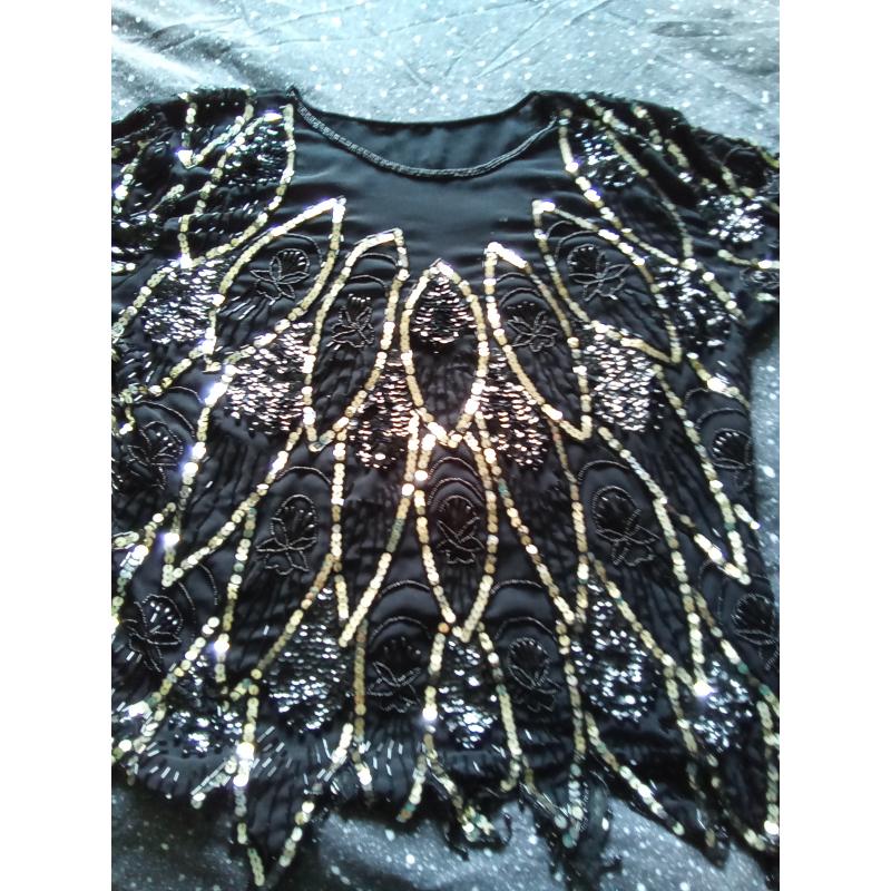Zeer mooie zwart met zilveren blouse