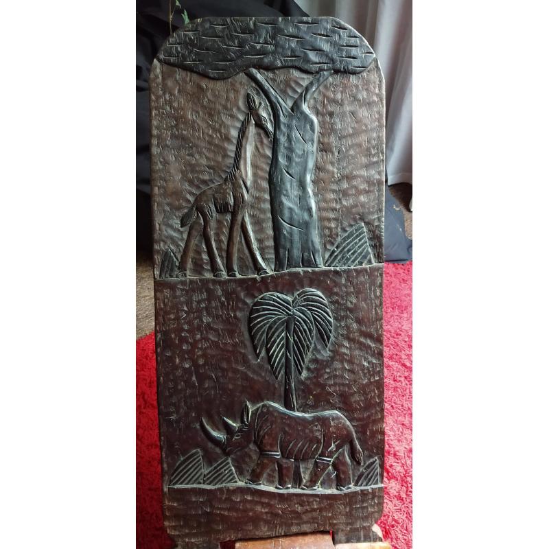 2 prachtige met de hand uitgesneden Afrikaanse stoelen