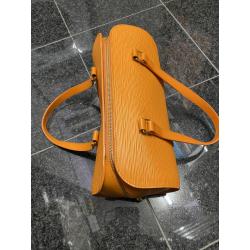 Oranje Louis Vuitton handtas