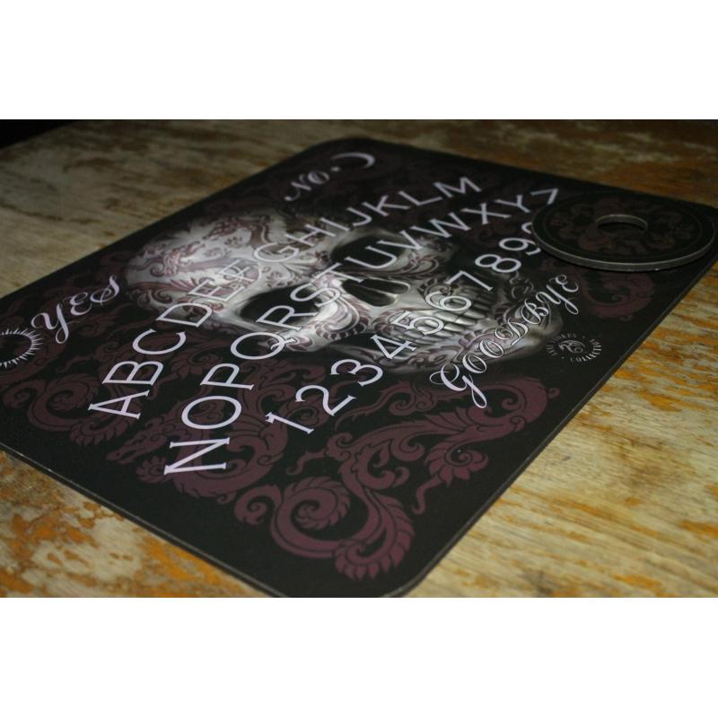 Ouija bord te koop met doodshoofd.