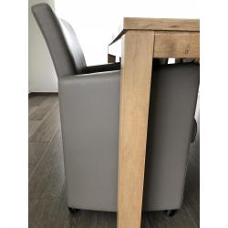 4 mooie kunst leren fauteuils op wieltjes