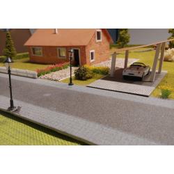 Diorama van een huis met een tuin