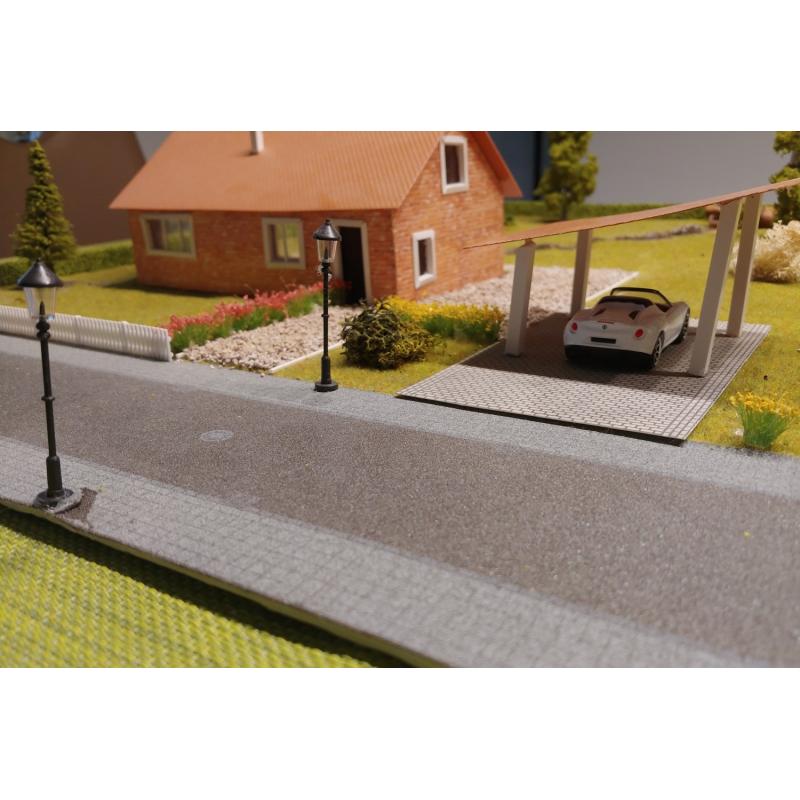 Diorama van een huis met een tuin