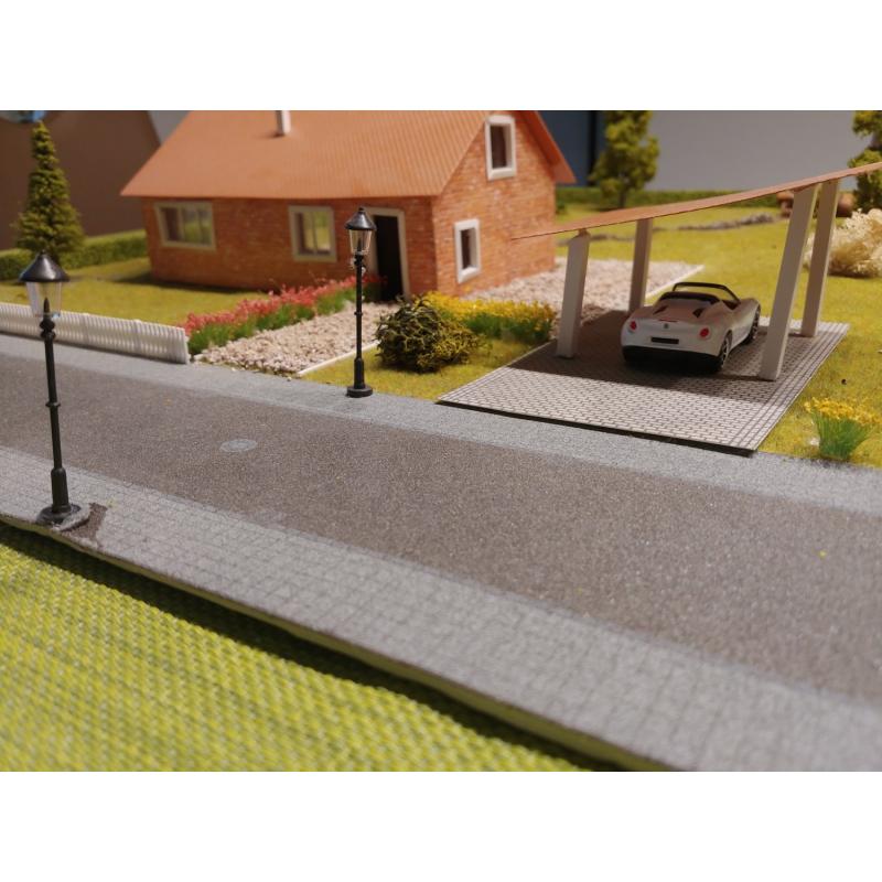 Diorama van een huis met een tuin