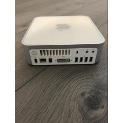 Te Koop een Mac Mini 2.1 Intel Core 2 Duo met Serienummer YM8331ZAYL1 met 1,83 Ghz met draadloos internet en een Video Verloop Dvi naar Vga of Dvi naar Hdmi.
