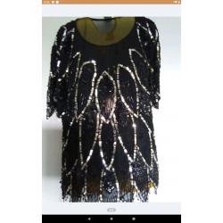 Zeer mooie zwart met zilveren blouse