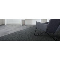 Yuton tapijttegels van Interface. In drie kleuren