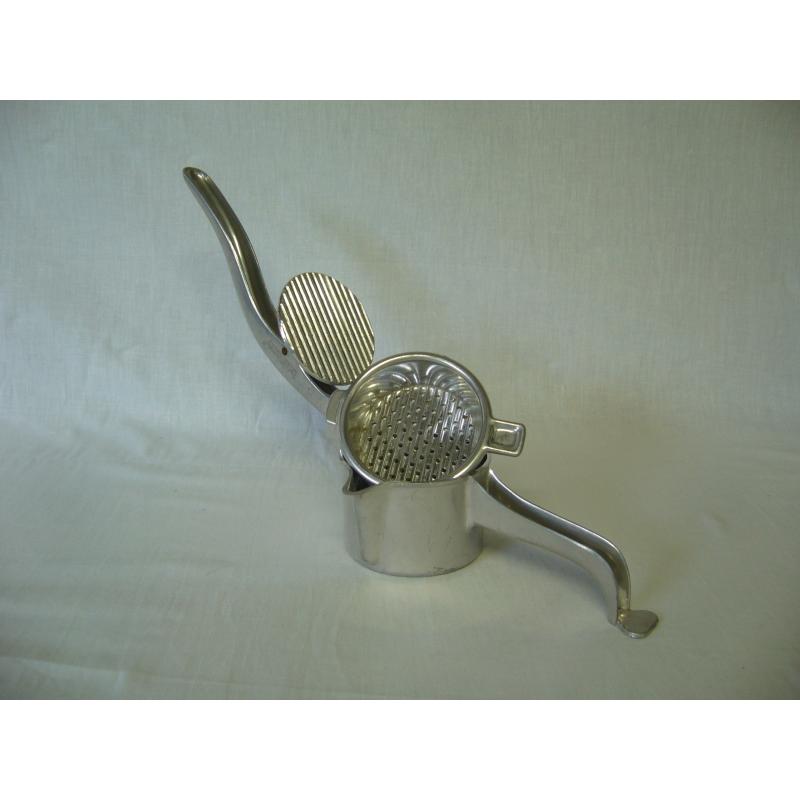 Antieke aluminium fruitpers