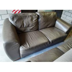 2 lederen sofa's