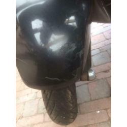 Vespa LX50 met windscherm